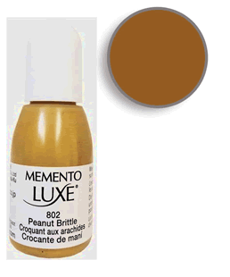 Buy a 1/2 oz. bottle of Memento Luxe Peanut Brittle refill for a Peanut Brittle Memento Luxe stamp pad.