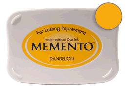 Buy a Memento Dandelion Stamp Pad! This is fast drying on most papers including glossy finishes.