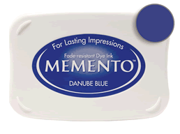 Buy a Memento Danube Blue Stamp Pad! This is fast drying on most papers including glossy finishes.