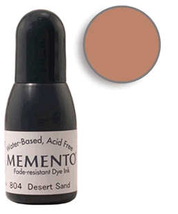 Buy a 1/2 oz. bottle of Memento Desert Sand refill for a  Desert Sand Memento stamp pad.