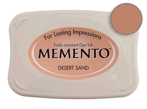 Buy a Memento Desert Sand Stamp Pad! This is fast drying on most papers including glossy finishes.