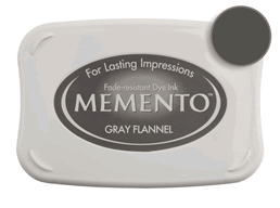 Buy a Memento Gray Flannel Stamp Pad! This is fast drying on most papers including glossy finishes.