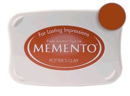 Buy a Memento Potters Clay Stamp Pad! This is fast drying on most papers including glossy finishes.