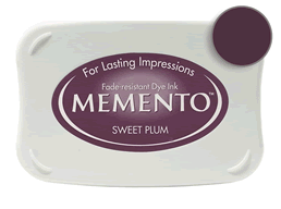 Buy a Memento Sweet Plum Stamp Pad! This is fast drying on most papers including glossy finishes.