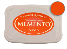 Buy a Memento Tangelo Stamp Pad! This is fast drying on most papers including glossy finishes.