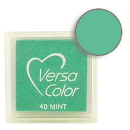 Purchase a vibrant and creamy mint Versacolor ink pad. Over 70 colors available!  Non-toxic, child-safe, acid free, water-soluble pigment ink.  Measures 15/16 inches by 15/16 inches.
